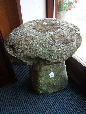 Appraisal: A limestone staddle stone high