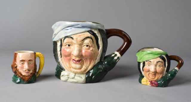 Appraisal: Royal Doulton Toby MugsTo include one Royal Doulton toby mug