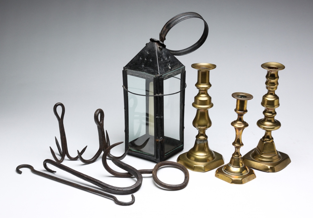 Appraisal: American th century Including three brass candlesticks tin candle lantern