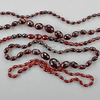 Appraisal: FIVE CHERRY BAKELITE BEAD NECKLACES ca Graduated strands of oblate