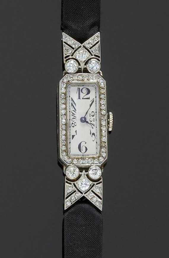 Appraisal: DIAMOND LADY'S WRISTWATCH ca Platinum Rectangular case No with diamond