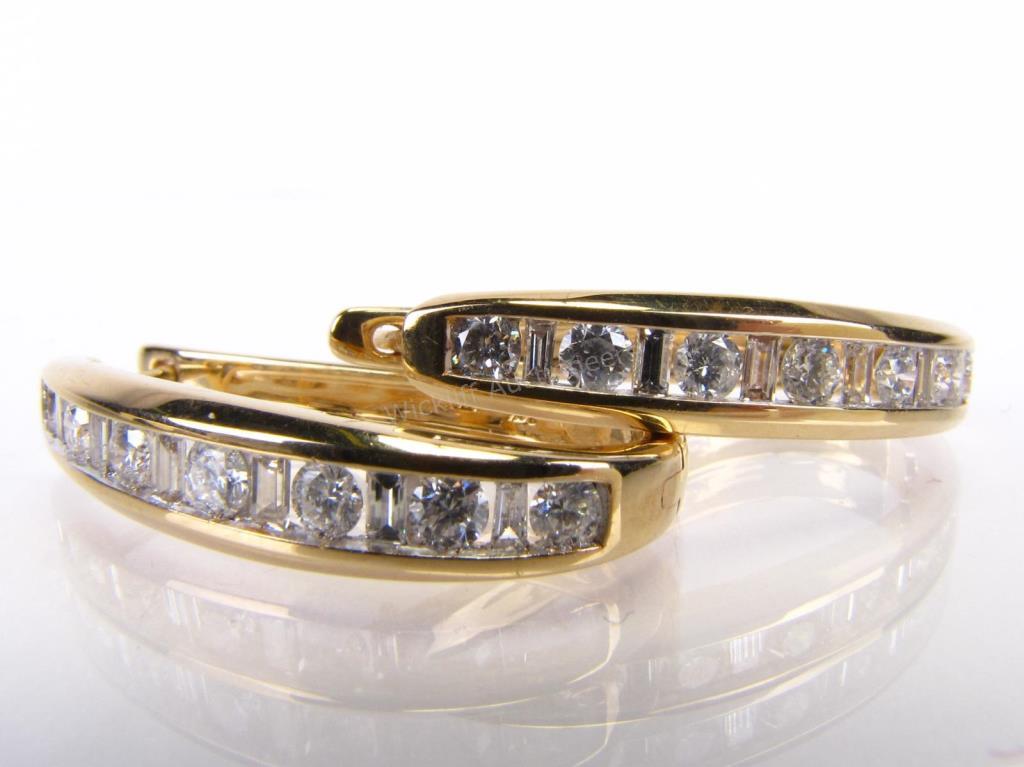 Appraisal: A pair of K yellow gold hoop earrings each with