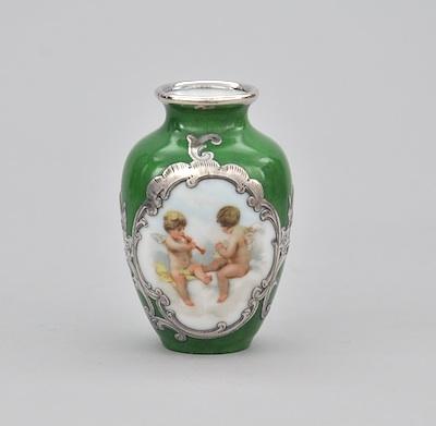 Appraisal: A Bavarian Silver Overlay Miniature Porcelain Vase With the image