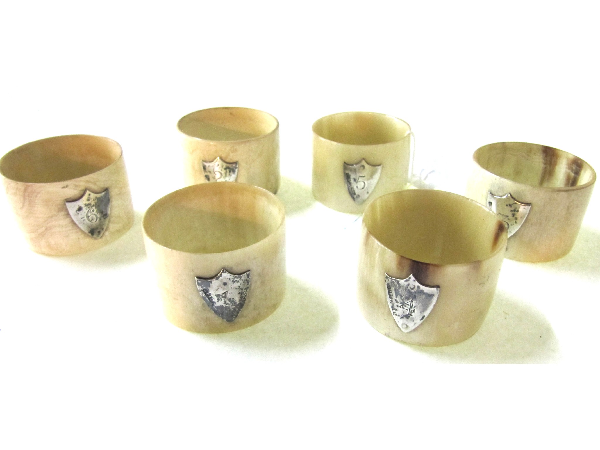 Appraisal: A set of six numbered bone napkin rings