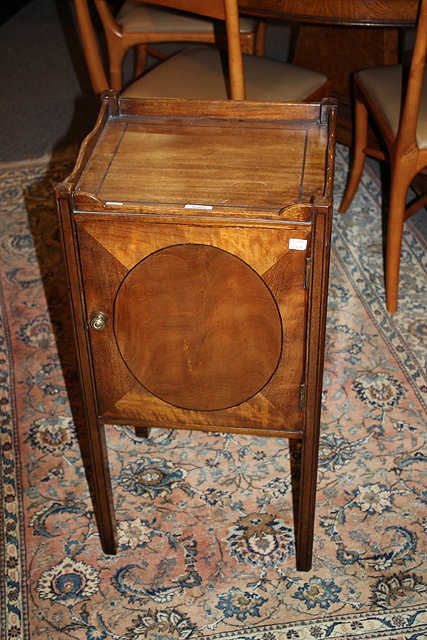 Appraisal: AN EDWARDIAN MAHOGANY AND INLAID BEDSIDE CUPBOARD with single panel