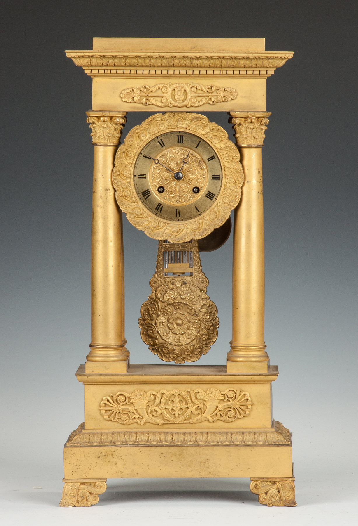 Appraisal: French Gilt Bronze Portico Clock th cent day time strike