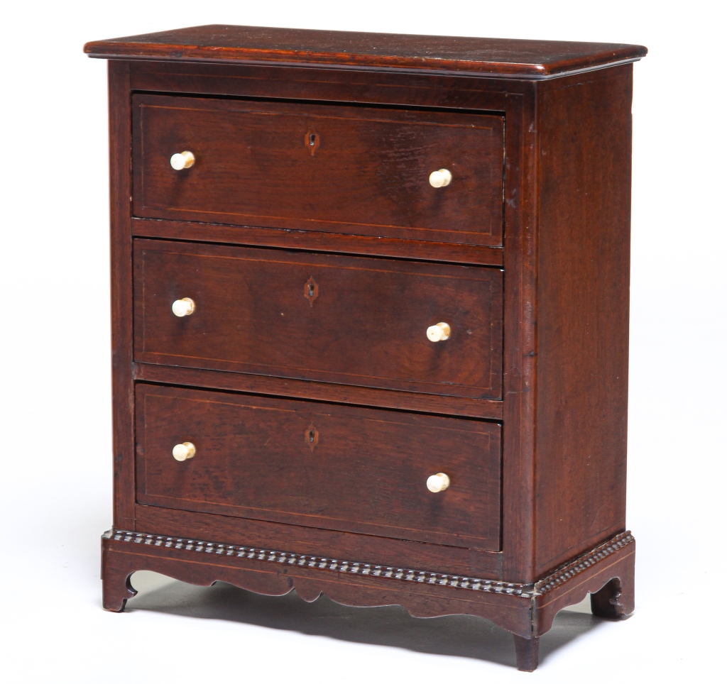 Appraisal: AMERICAN MINIATURE CHEST OF DRAWERS Mid th century walnut with