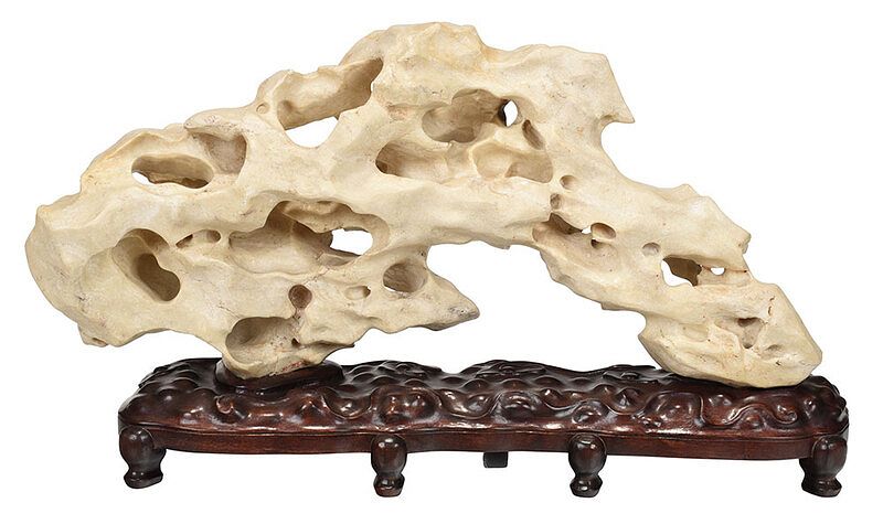 Appraisal: Chinese Scholar's Rock on Stand probably th century ivory colored