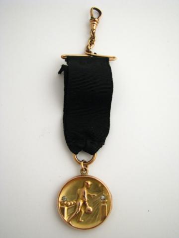 Appraisal: Antique gold-filled bowling motif watch fob with silk ribbon