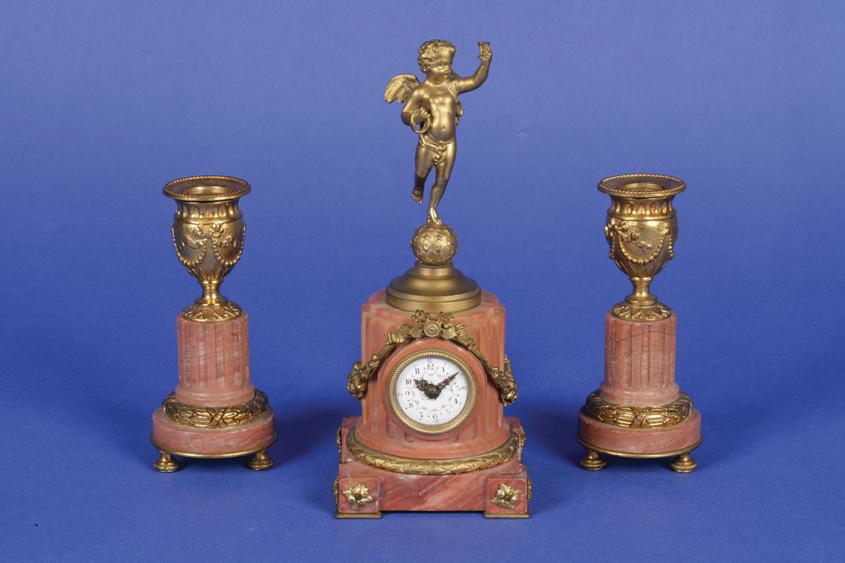 Appraisal: A TH CENTURY FRENCH PINK MARBLE AND ORMOLU CLOCK GARNITURE