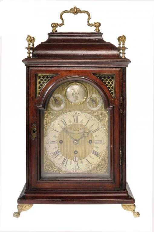 Appraisal: A NORTHERN EUROPEAN MAHOGANY BRACKET CLOCK the breakarched engine turned