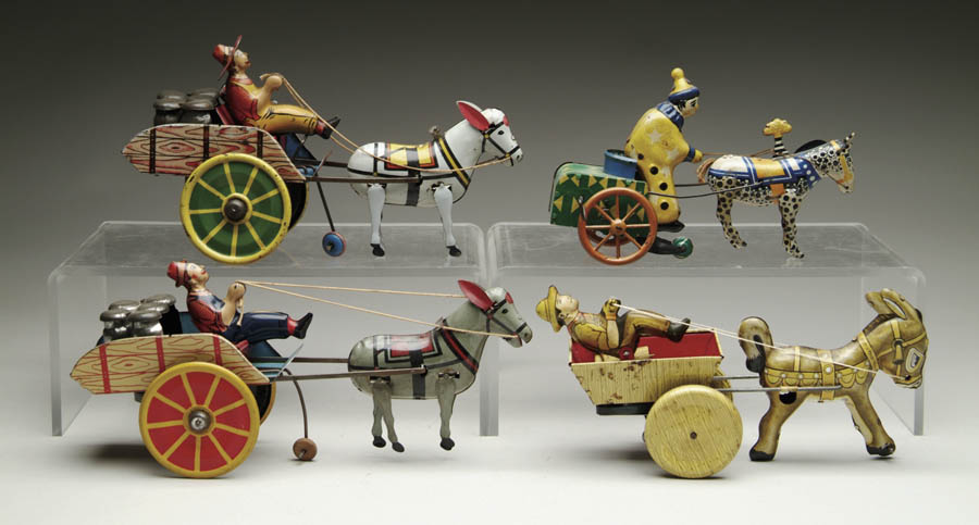 Appraisal: LOT OF TIN HORSE DRAWN CARTS Consisting of Lewis Marx