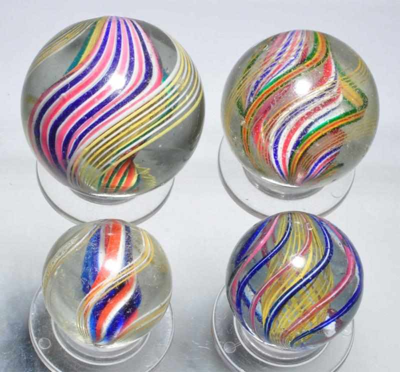 Appraisal: Lot of Swirl Marbles Description Largest is a double ribbon