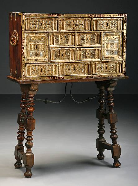 Appraisal: A Spanish Baroque parcel gilt and gilt iron mounted shell