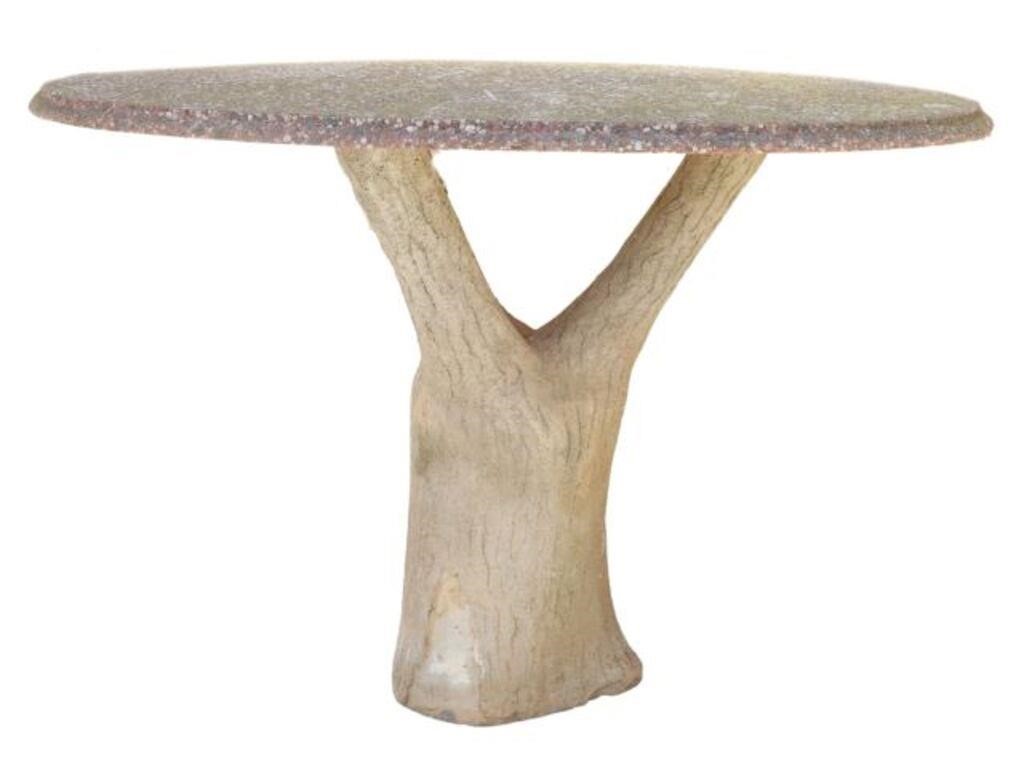 Appraisal: Cast stone table with ovular stepped top rising on faux