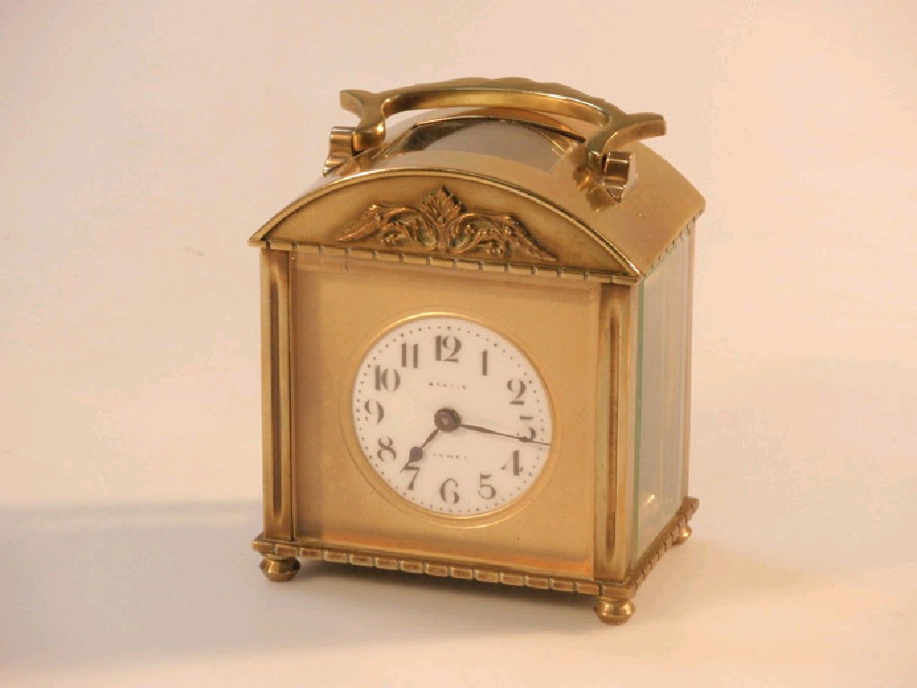 Appraisal: A gilt metal carriage style clock with a timepiece movement