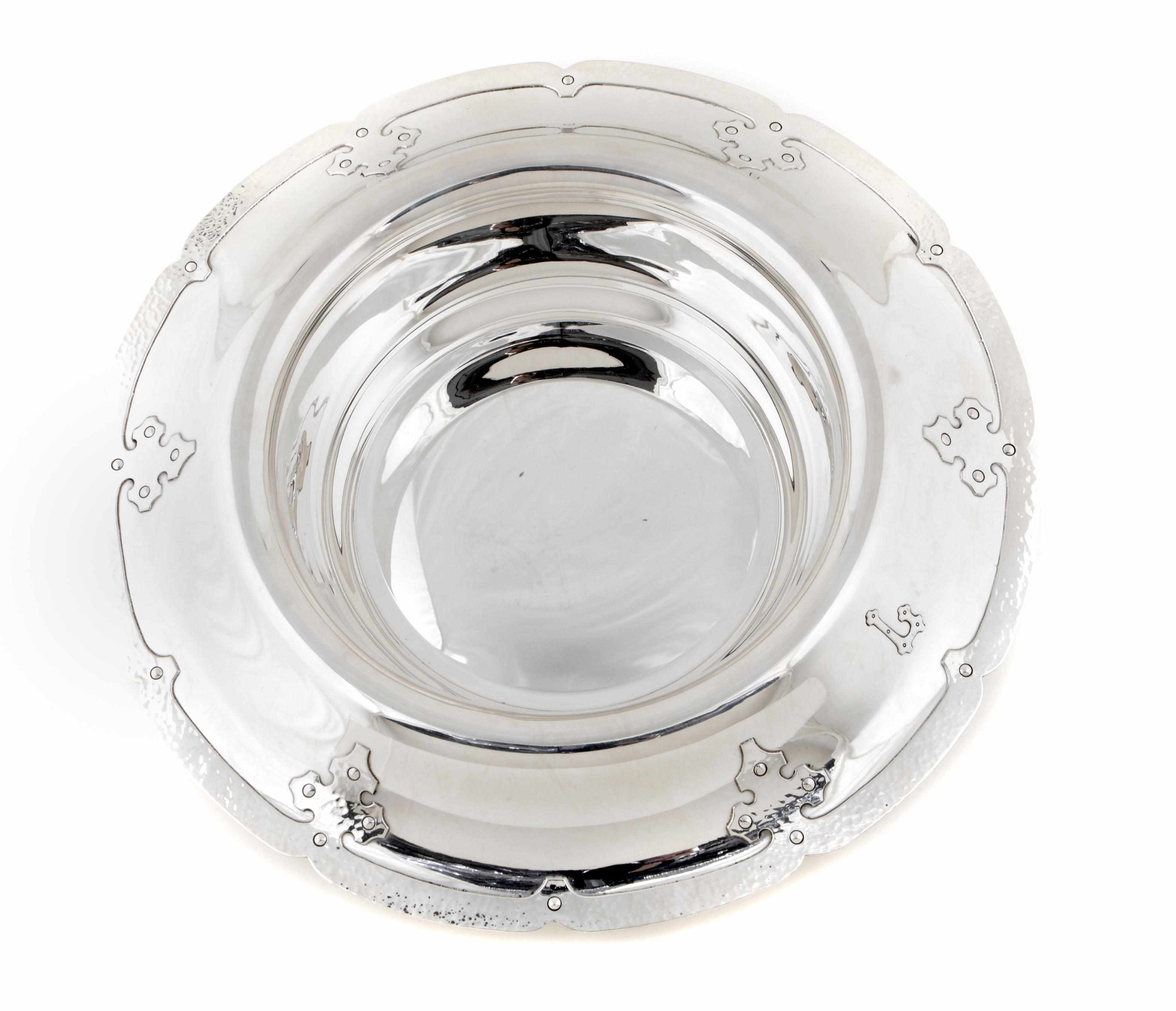 Appraisal: An Arts Crafts style hammered sterling silver centerpiece in the