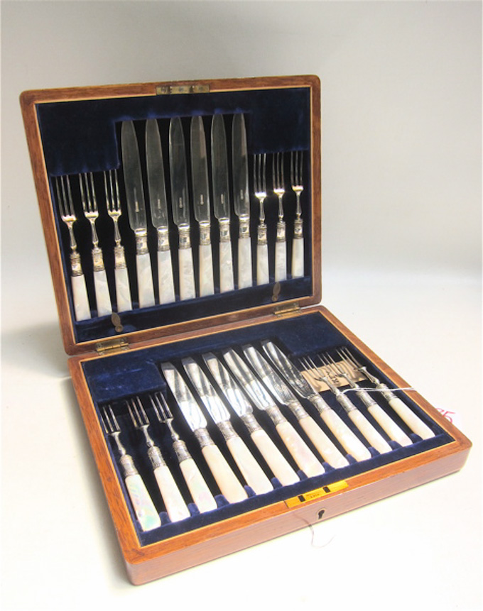 Appraisal: MOTHER OF PEARL SILVER PLATED FLATWARE SET in storage chest