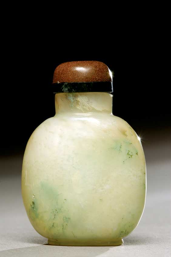 Appraisal: ANTIQUE JADEITE SNUFF BOTTLE Finely hollowed and antique carved jadeite