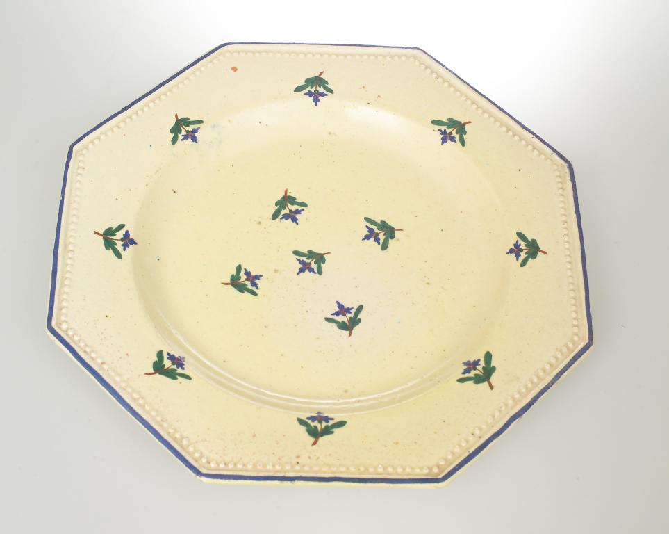 Appraisal: FRENCH FAIENCE CHARGER th CENTURY of octagonal form with beaded