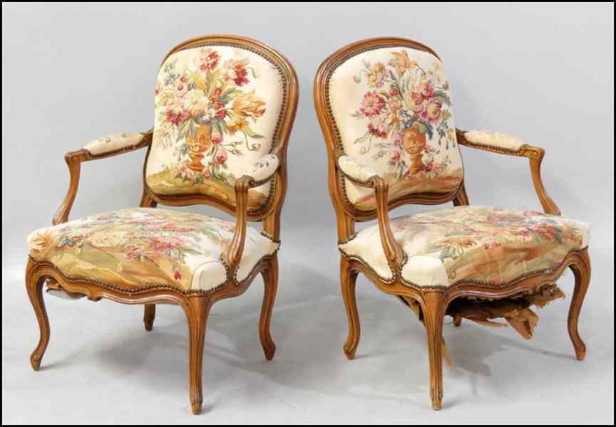 Appraisal: PAIR OF FRENCH CARVED WALNUT FAUTEUIL H '' W ''