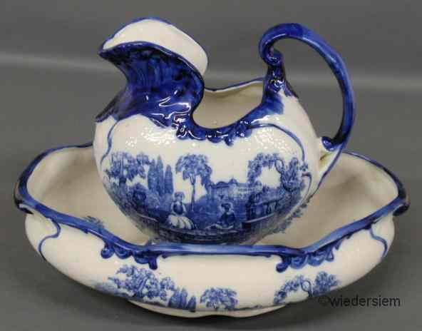 Appraisal: English Staffordshire washbowl and pitcher with blue transfer decoration in