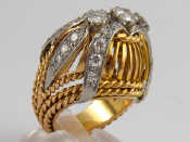 Appraisal: A French hallmarked marks rubbed carat gold diamond bombe ring