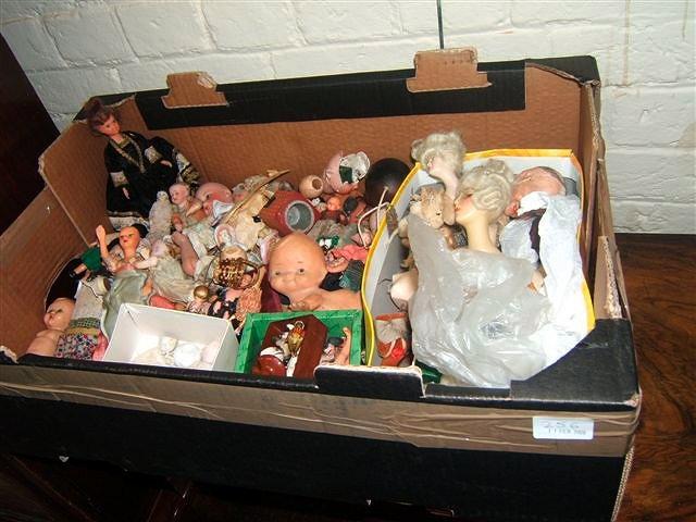 Appraisal: A quantity of antique bisque papier mache and wax dolls