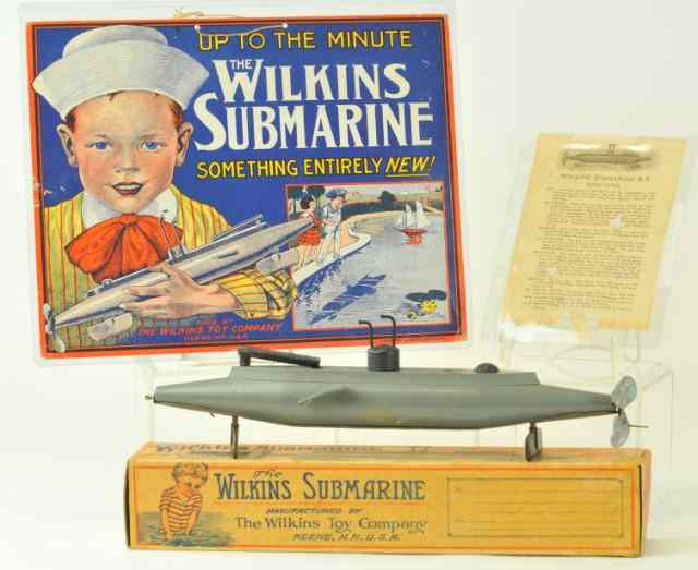 Appraisal: WILKENS WOODEN SUBMARINE Boxed example with directions from - sub