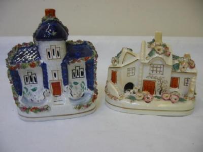 Appraisal: A STAFFORDSHIRE PORCELAIN COTTAGE modelled with a dog outside applied