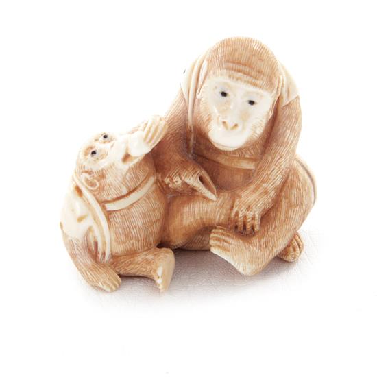 Appraisal: Japanese carved and stained monkey netsuke signed Meiji period seated