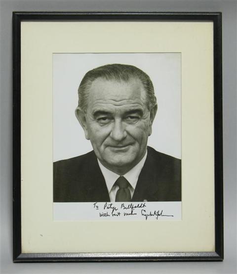 Appraisal: LYNDON BAINES JOHNSON SIGNED PHOTOGRAPH Black and white portrait photograph