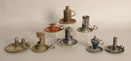 Appraisal: Group of eight tin lighting devices including a tole decorated