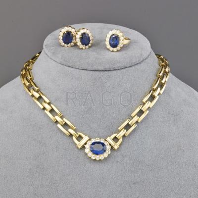 Appraisal: SUITE OF SAPPHIRE AND DIAMOND K GOLD JEWELRY Oval faceted