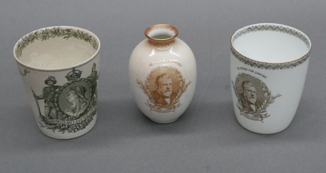 Appraisal: Three various Royal Doulton commemorative beakers and a posy vase