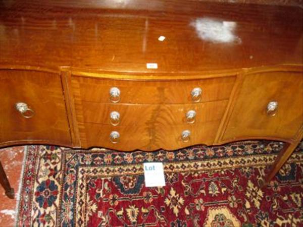 Appraisal: A Georgian style mahogany sideboard serpentine outline