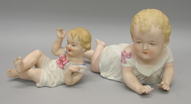 Appraisal: Pair of bisque piano babies Marked German reclining baby in