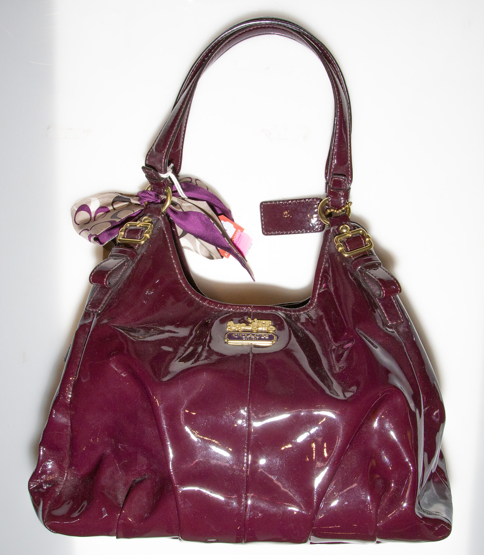 Appraisal: COACH BURGUNDY PATENT LEATHER HANDBAG WALLET serial G - in