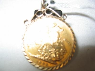 Appraisal: A GOLD SOVEREIGN loose mounted as a pendant