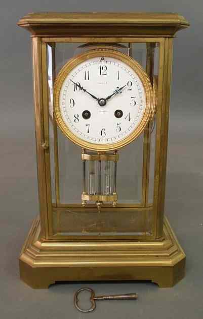 Appraisal: French brass mantel clock with beveled glass porcelain face marked