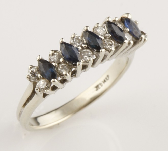 Appraisal: KW marquise cut sapphires and round diamonds approximately cttw diamonds