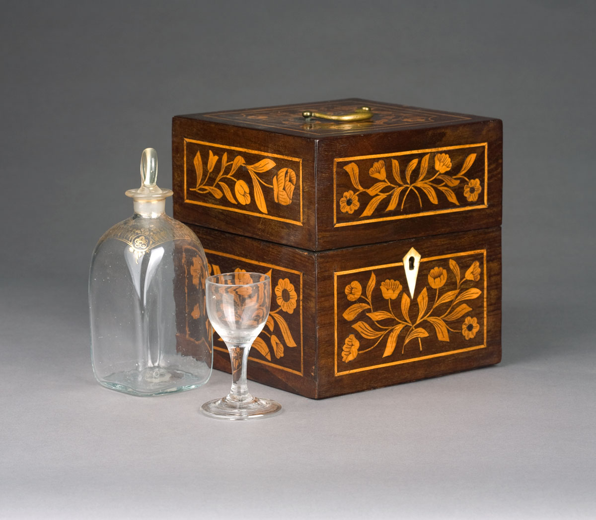 Appraisal: GEORGE III DECANTER SET HOUSED IN A FITTED SATINWOOD-INLAID MAHOGANY