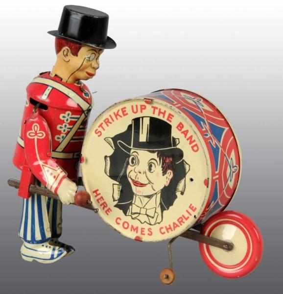 Appraisal: Tin Marx Charlie McCarthy Band Wind-Up Toy Description American Working