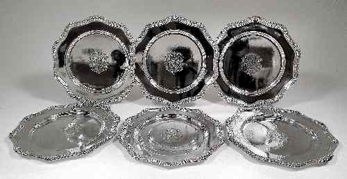 Appraisal: Six American silver plates the shaped rims cast with fruiting