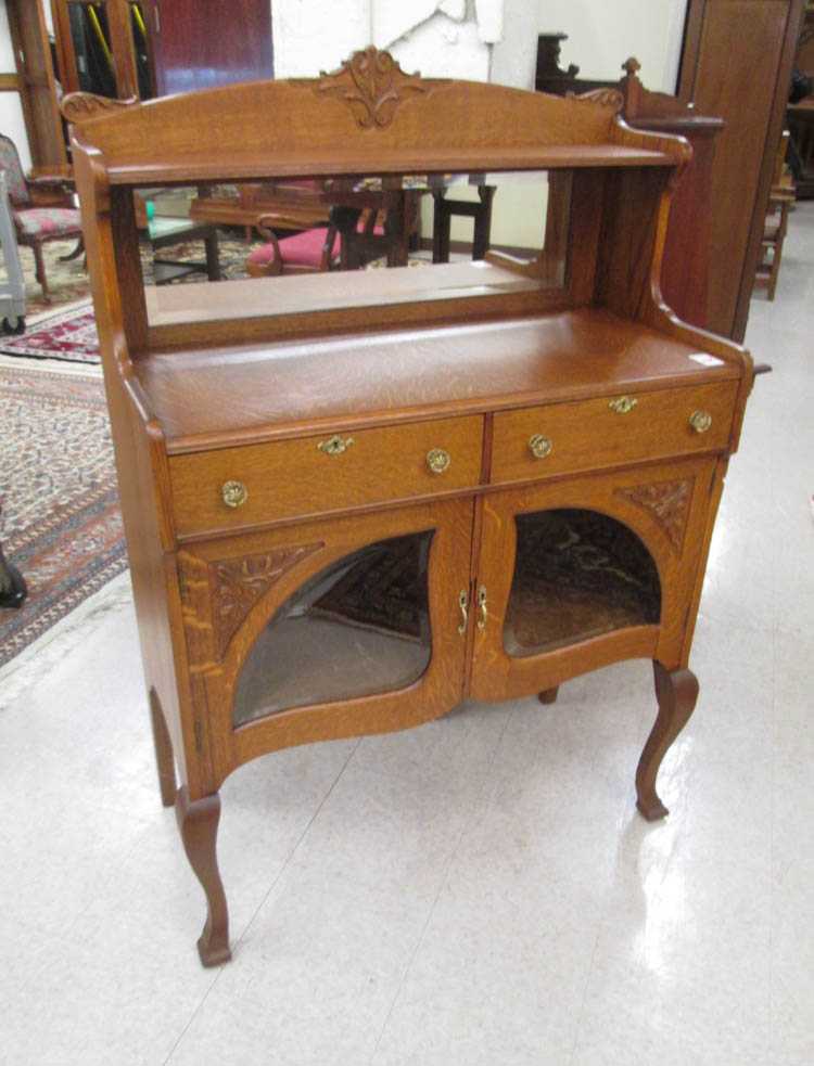 Appraisal: AN OAK CHINA BUFFET American late th century the top