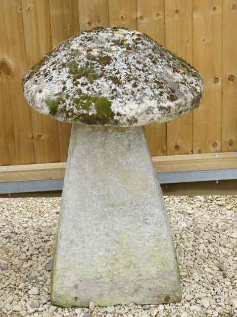 Appraisal: A NEAR PAIR OF COTSWOLD LIMESTONE STADDLE STONES with rectangular