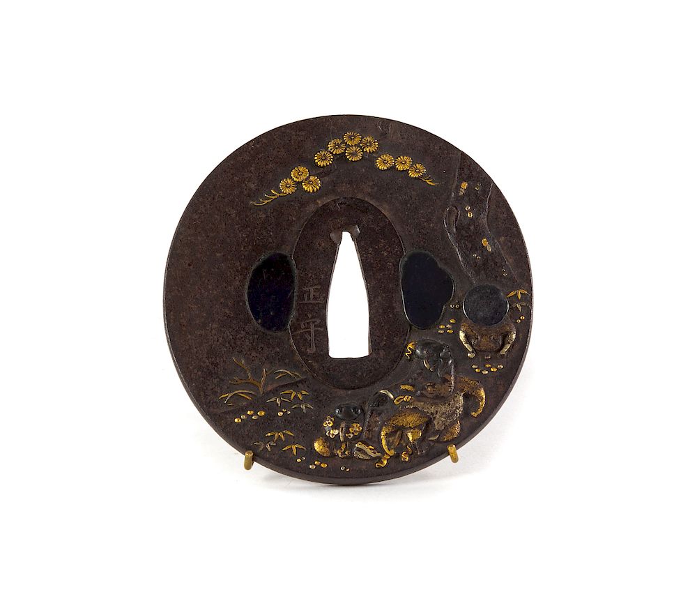 Appraisal: A Japanese Mixed-Metal Tsuba Width in cm A Japanese Mixed-Metal