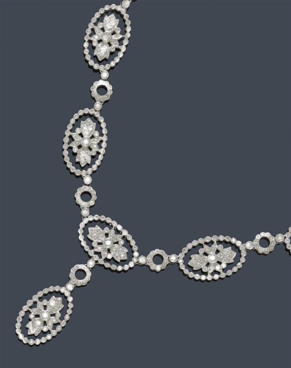 Appraisal: A DIAMOND NECKLACE White gold Y necklace composed of textured