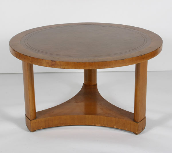 Appraisal: Dunbar round leather-top coffee table three half-round legs and triangular