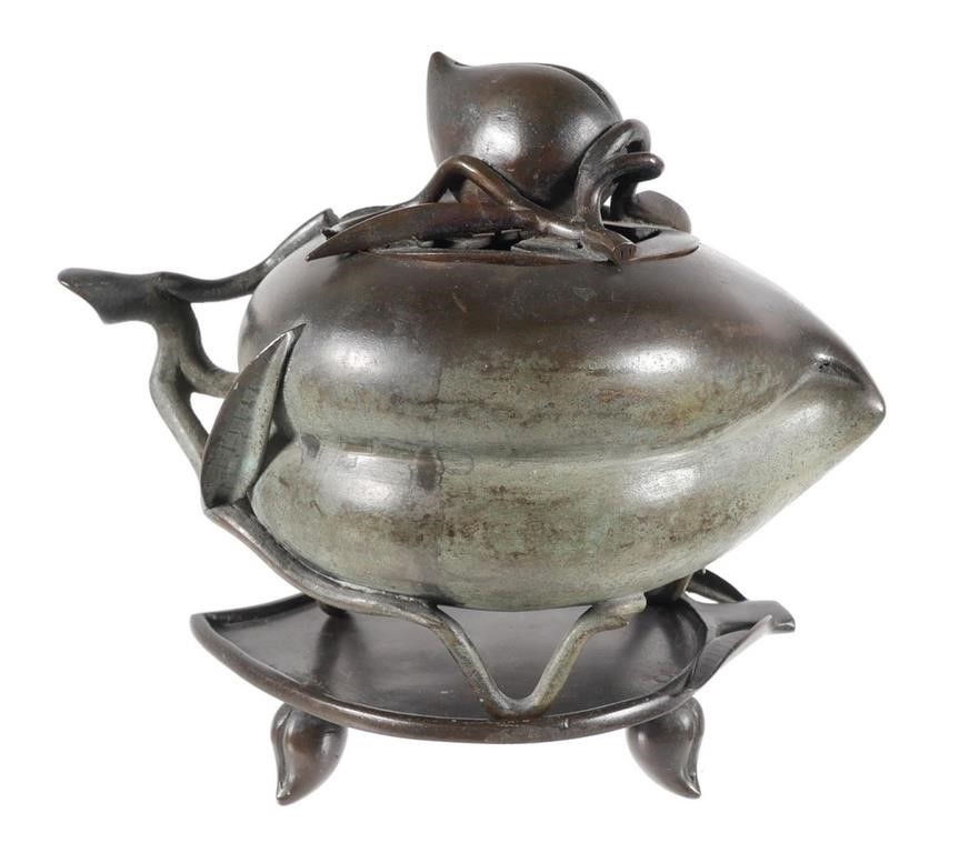 Appraisal: CHINESE BRONZE PEACH INCENSE BURNERBronze incense burner shaped like a